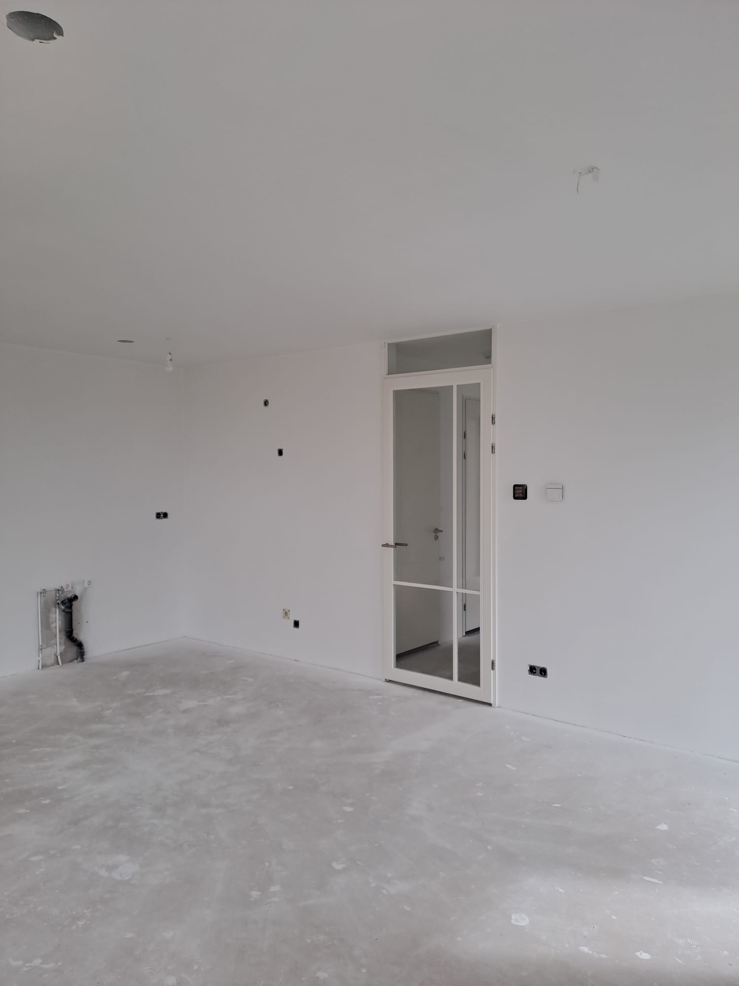 Woonkamer Amsterdam stucwerk 2